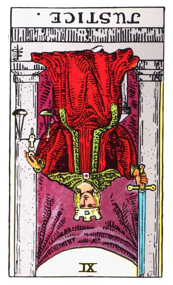 justice tarot card reversed meaning