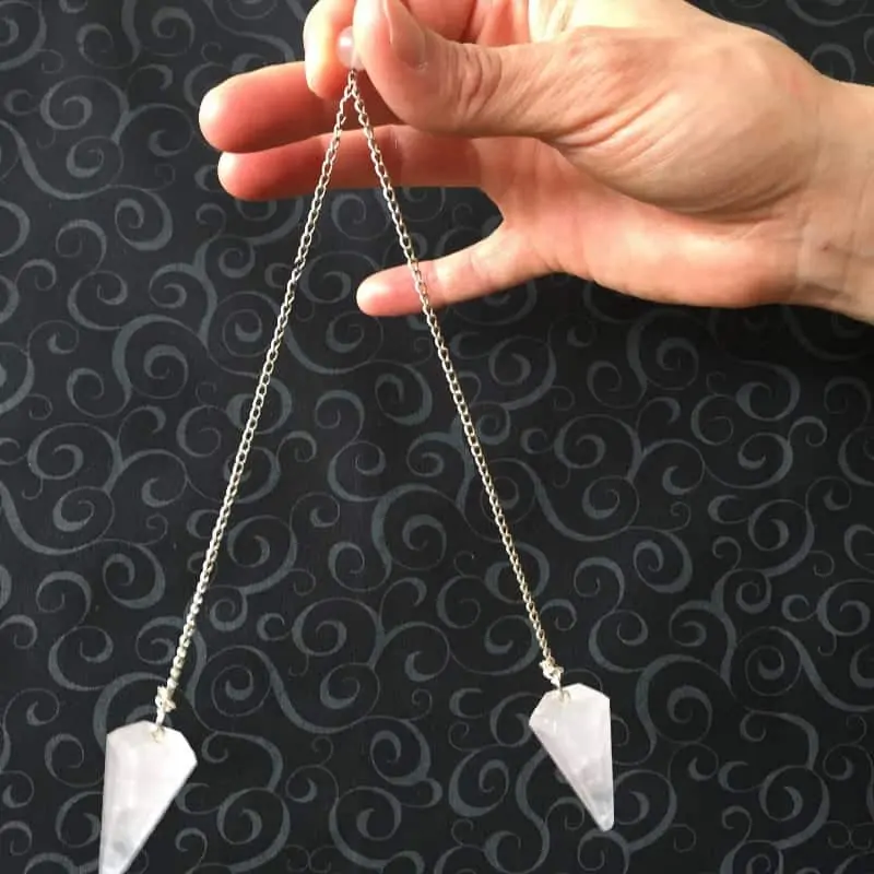 crystal pendulum in use