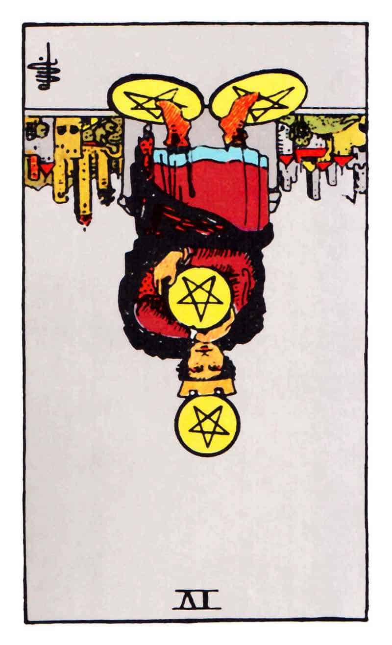 four of pentacles reversed